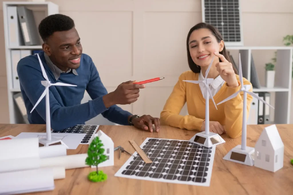Duas pessoas discutindo energias renováveis